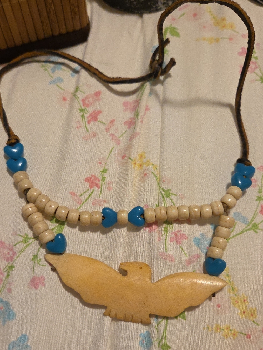 Handmade Thunderbird Pendant Necklace with Blue Heart Beads